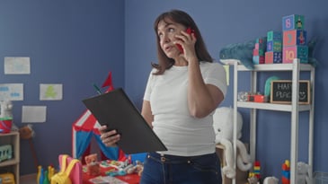 busy teacher on her phone 