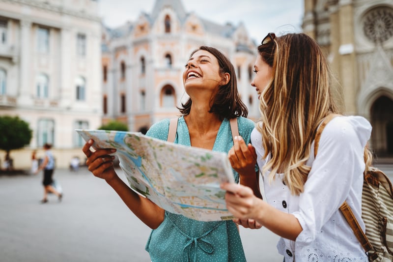 women traveling after using their loyalty points