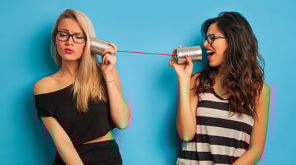 two consumers talk though a tin can on a string consumer advocates