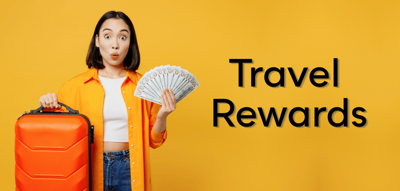 Travel rewards program traveler holds suitcase and money