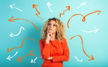 woman decides whether to upsell, offer a customer loyalty program or both