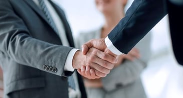 a handshake signifies b2b loyalty