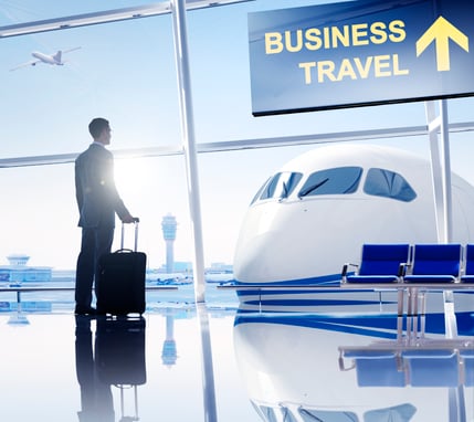 Man in a business suit waiting for a flight